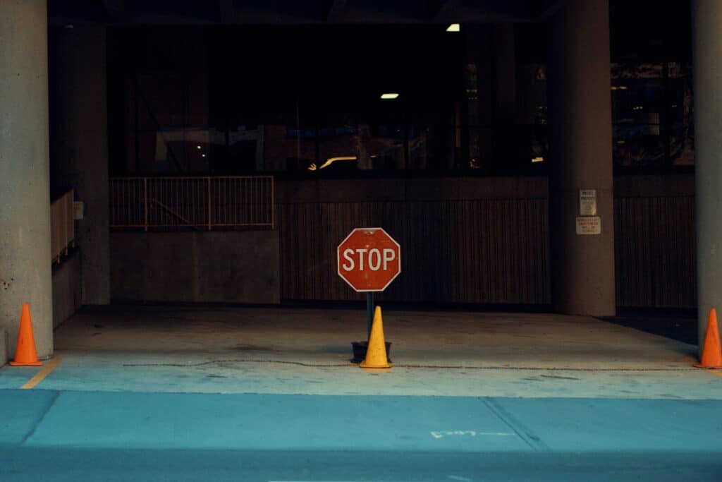 selective focus photography of stop signage